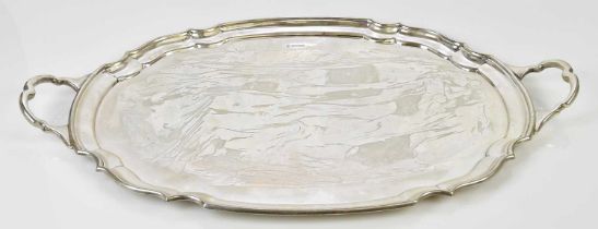 JAMES DEAKIN & SONS; a George V hallmarked silver twin handled tray, with scalloped edge,