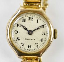 ROLEX; a lady's vintage 9ct yellow gold wristwatch with Arabic numerals to the signed silvered