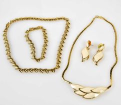 NAPIER; a gold tone necklace with matching bracelet and a cream enamel necklace with matching