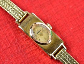 GIRARD PERREGAUX; a lady's vintage 18ct yellow gold wristwatch with seventeen jewel movement no.