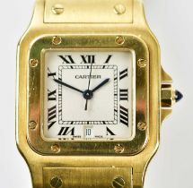 CARTIER; an 18ct gold gentleman's Santos wristwatch with Roman numerals to the ivory coloured dial