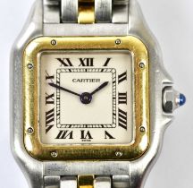 CARTIER; a lady's stainless steel and yellow gold Panthère wristwatch with Roman numerals to the