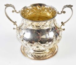 HARRISON BROS; a Victorian hallmarked silver twin handled footed bowl with repoussé gadrooned