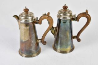 OLLIVANT & BOTSFORD; an Elizabeth II hallmarked silver hot water pot and matching coffee pot, with