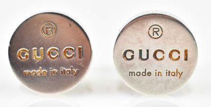 GUCCI; a pair of hallmarked silver cufflinks with embossed name logo to tab, in original pouch and