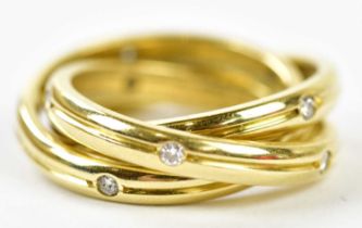 CARTIER; an 18ct yellow gold diamond set trilogy ring, no.259243, size K/L, approx 10.3g,