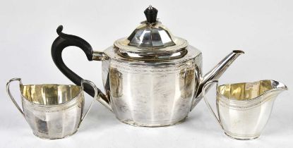 ROBERTS & BELK; a George V hallmarked silver three piece bachelor tea set, Sheffield 1925, length of