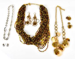 GIVENCHY; a silver and gold tone necklace and matching earrings (one af), a John Rivers classic