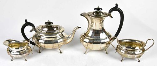 VINERS; a George V hallmarked silver four piece tea service with panelled decoration, Sheffield