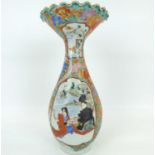 An early 20th century Chinese porcelain vase of baluster shape, with flared wavy rim, decorated with