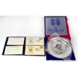 An Elizabeth II hallmarked silver commemorative plate commemorating the Silver Wedding