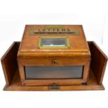 A 19th century brass mounted oak letter and telegram box, the front slope with black heightened