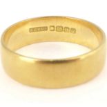 An 18ct gold band ring, size N, approx. 3.9g.