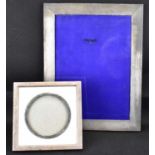 WILLIAM COMYNS & SON; an early 20th century hallmarked silver photograph frame, 17 x 17cm, and a