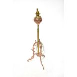 A 19th century copper and brass telescopic standard lamp converted from a paraffin lamp, with