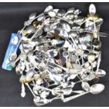 A mixed quantity of collectors' spoons to include some silver examples.