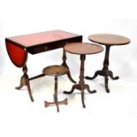 Three early 20th century circular occasional tables, including a wine table and a mahogany