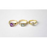 A 9ct gold ring set with blue stone, a 9ct gold ring set with purple stone, combined approx. 6.6g,