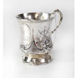 A hallmarked silver Christening mug with inscription to front '...From Cousin Albert 1864',