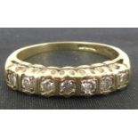 A 9ct gold seven-stone diamond ring, the tiny diamonds approx. 0.25ct, size K, approx. 2.1g.