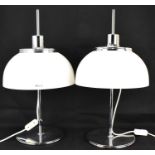 HARVEY GUZZINI; a pair of late 1960s/early 1970s Italian Faro design table lamps with white