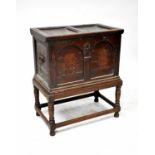A late 18th/early 19th century key lock chest with panelled top, arched front, iron lock and