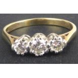 A 9ct gold three-stone diamond ring set with three graduated diamonds, the central diamond approx.