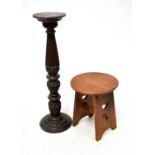 A small oak circular top table with heart-shaped cut-outs to the sides, circular top, height 46cm,