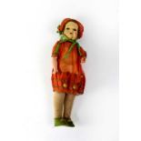 An early/mid 20th century German bisque head doll with closed mouth, open-and-shut eyes, mohair hair