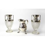 A pair of Edward VII cut glass baluster vases to stepped circular bases with hallmarked silver Art