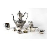 A collection of plated ware to include coffee pot, three mugs, inkwell with blue liner, vesta, sauce