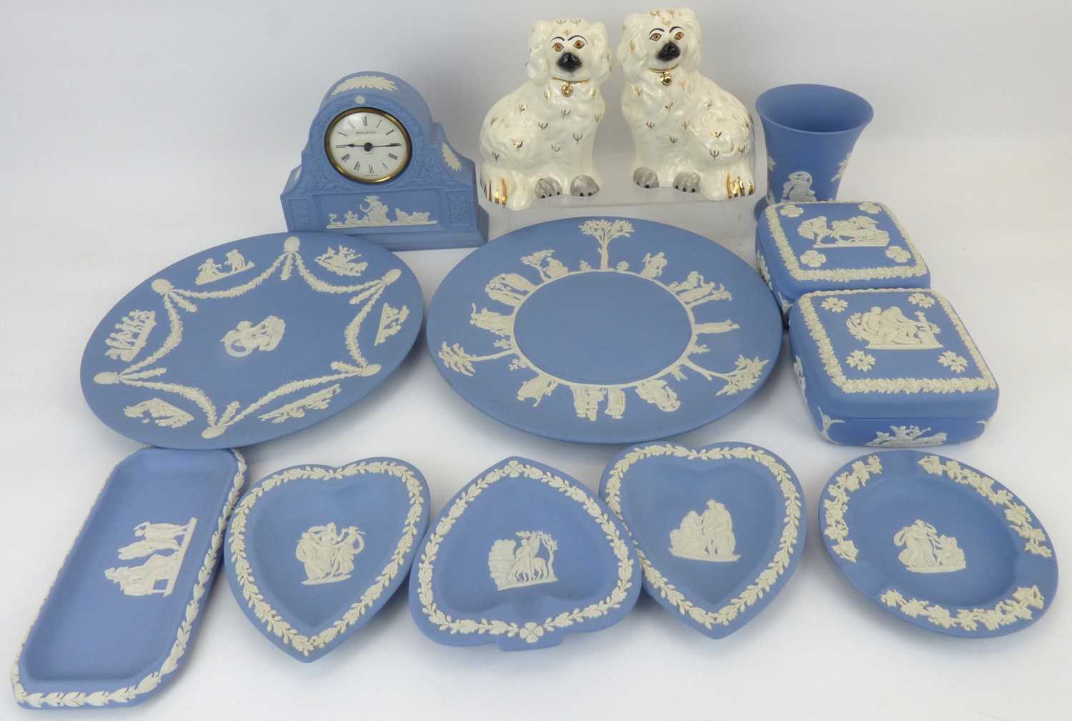 WEDGWOOD; eleven items of powder blue jasperware comprising a small domed top table clock, height
