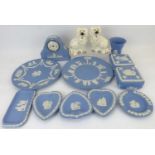 WEDGWOOD; eleven items of powder blue jasperware comprising a small domed top table clock, height