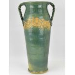 PILLING POTTERY; a modern bespoke tall vase in the form of a ewer, in an organic style, with braided