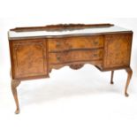 A reproduction burr walnut sideboard with raised back, above two central drawers flanked by pair