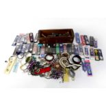 A collectors' lot comprising costume jewellery, wristwatches, collectors' spoons, a nutcracker, a