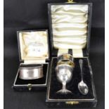 Two hallmarked silver Christening sets comprising an Alexander Clark & Co hallmarked silver napkin