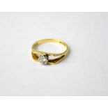 An 18ct yellow gold ring set with white stone, size N1/2, approx. 3g.