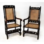 Two similar reproduction 17th century style armchairs with carved leaf and shell top rails, twist