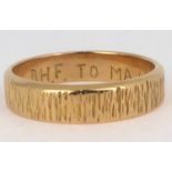 A 14K (585) gold textured band ring, inscribed to shank interior 'R.H.F to MAMCK 8.2.77', size N,