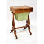 A Victorian walnut crossbanded sewing table c.1880, with sewing compartments, pull-out material