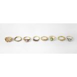 Eight 9ct yellow gold rings, four set with small diamonds, combined approx. 21g (8).