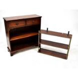 A small mahogany two-drawer bookcase raised on bracket feet, 80 x 76 x 28cm, together with a set