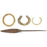 Four African or Middle Eastern items comprising a small fishing spear, length 30cm, a twisted