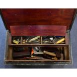 A large vintage wooden tool chest containing various modern and vintage workshop tools, 38 x 78 x