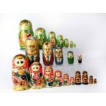 Five Russian dolls, to include one with image of Russian presidents, and two miniature examples (