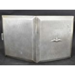 A George V hallmarked silver square cigarette case with RAF wings to the front and all-over engine