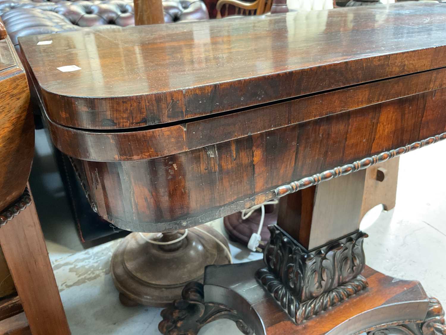 A Victorian rosewood fold-over table to rectangular column support with carved acanthus leaf - Image 4 of 8