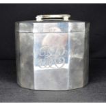 A George V hallmarked silver tea caddy of lozenge shape with initials BC to the front, William