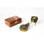 A T.G. & Co Ltd military 1941 compass, contained in cedarwood box with brass anchor to the top.